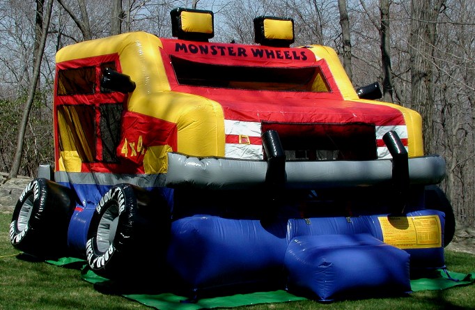Kids love to play in our Monster Wheels Bounce House