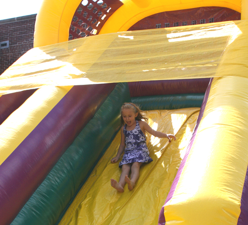 Kids love sliding on a giant inflatable slide
